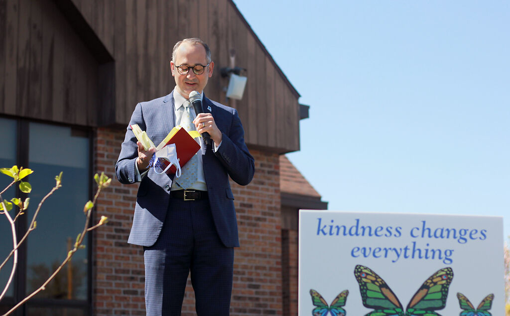 Peter Stiepleman reads a prepared poem during the Children's Grove tree dedication